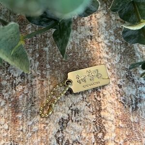 Coach Gold Tag Keychain with Horse and Carriage